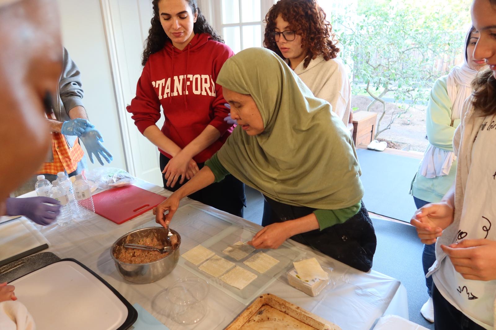 Students connecting with community members representing connection and relationships